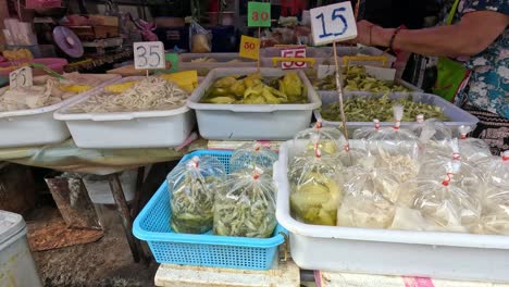 various fruits and vegetables sold at market stall