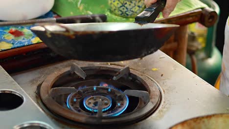 egg preparation for pad thai in bangkok market