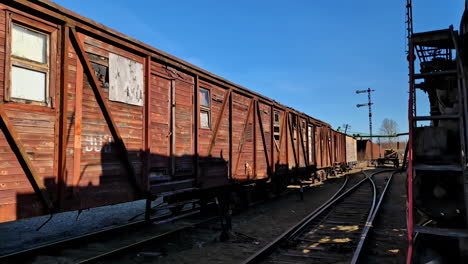 Old-Wooden-Train-Carriage-During-Sunny-Day-In-Cinevilla-Studio-In-Latvia