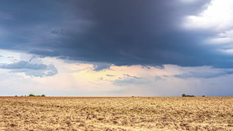 a time lapse shot of a strong wind shear circulating above a dry landscape