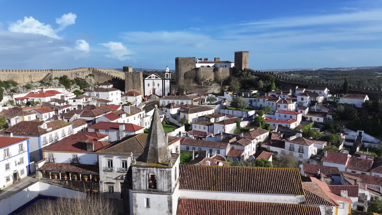 Obidos Village At Obidos In Leiria Portugal. Old Town Skyline. Medieval Buildings Scenery. Beautiful Cityscape. Obidos Village At Obidos In Leiria Portugal. Cultural Heritage.