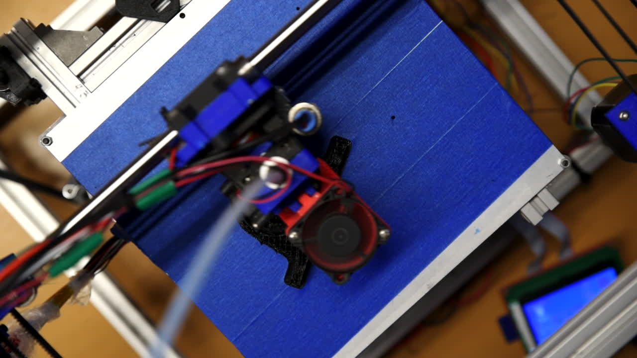 Top down view of a 3D printer in a school makerspace printing student CAD designs