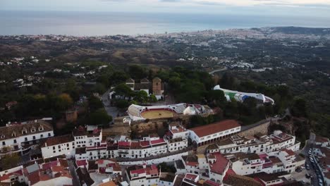 township of mijas with white architecture, aerial drone view