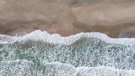 Static-top-shot-of-the-mediterranean-sea-sandy-beach-near-Montpellier