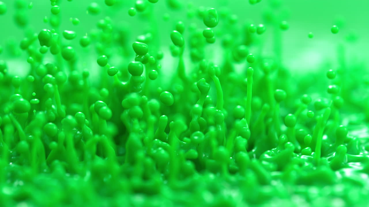 초록색 우유 같은 페인트가 어지고 서 있는 파도, 거시적이고 느린 움직임으로 추상적인 액체를 만니다.