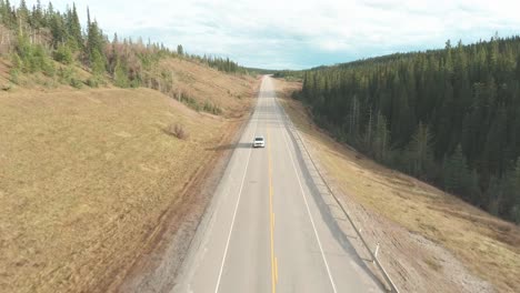 front panoramic shot of a silver truck driving on the highway