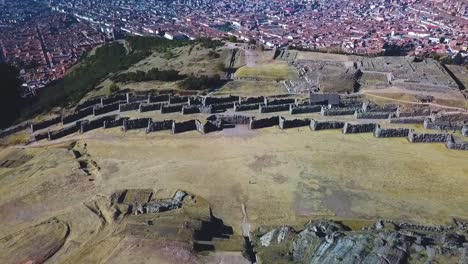 drone revealing sacsayhuaman incan ruin in peru