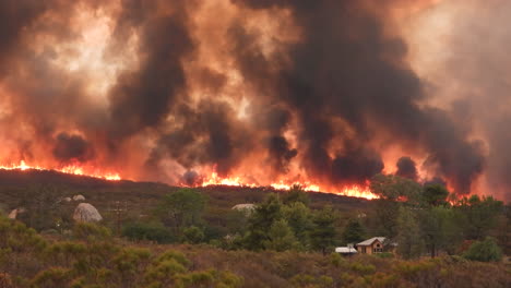 timelapse of deadly wildfire coming towards a house in a hill forest