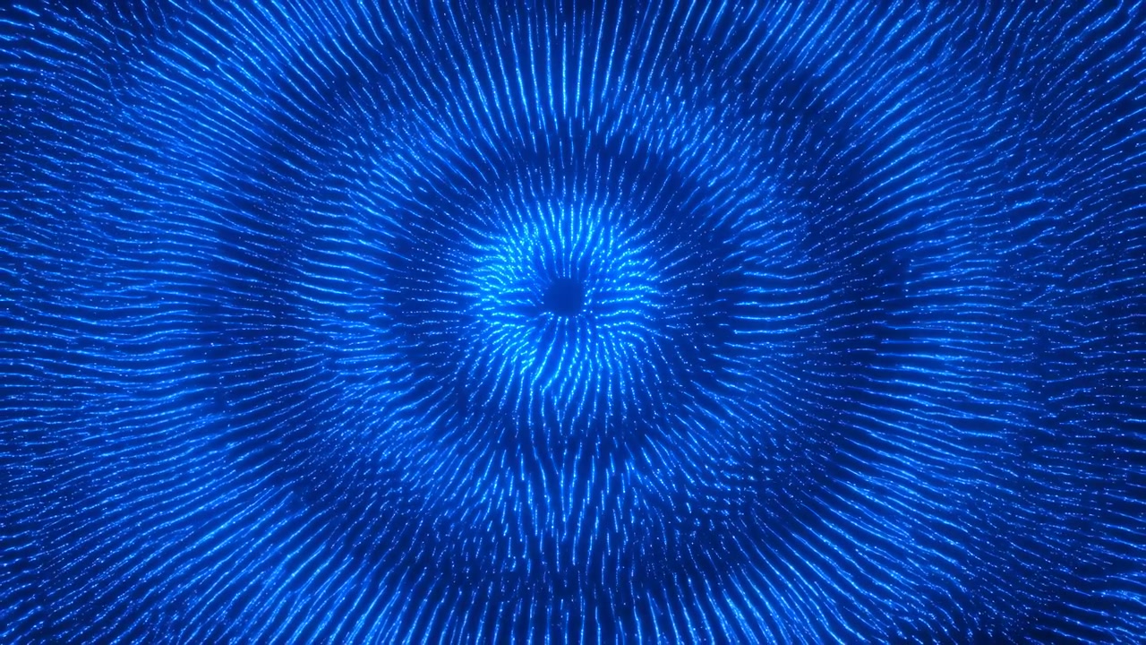 Glowing blue dotted strands spread from central vortex as circular rings widen and dense luminous lines fill frame, creating symmetrical wave motion against near-black background.