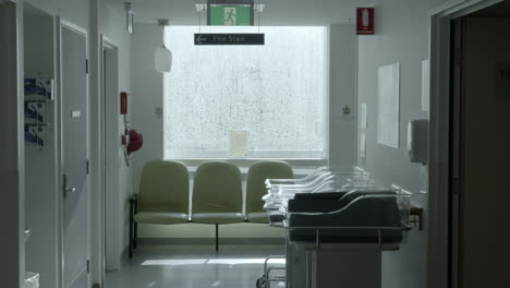 hospital corridor with baby capsules bedding in maternity ward