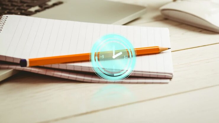 Animation of clock moving over desk with notebook and laptop