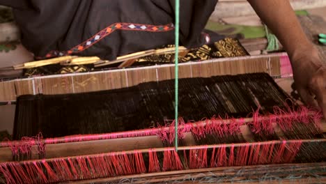 Woman-Removing-and-Inserting-Weaving-Sword