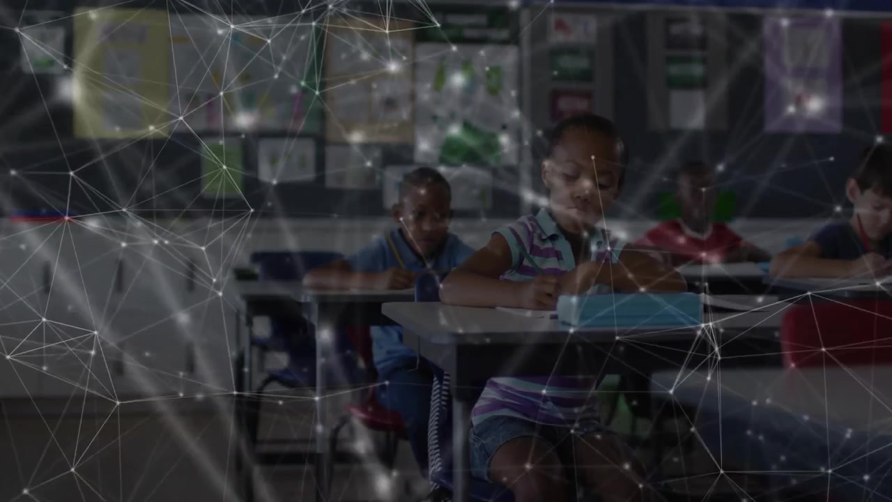 Girl writing in classroom starting digital network drifting across peers desks during education