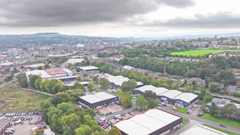 Exterior-drone-shot-industrial-warehouses-and-business-park-in-England