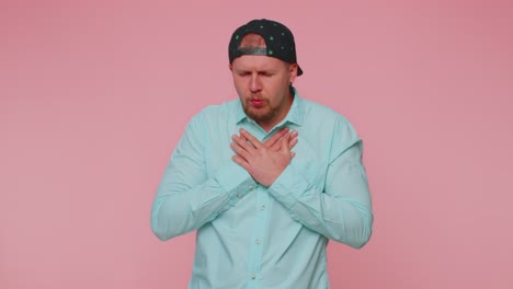 unhealthy man covering mouth with hand feeling sick allergy or viral infection asthma symptoms