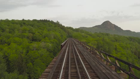 aerial low angle onawa trestle bridge railway tracks