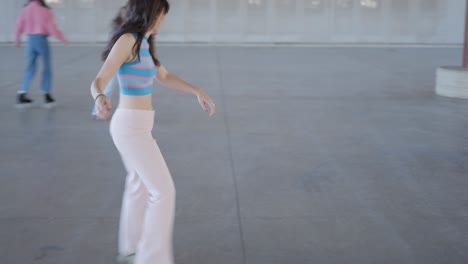Young Women Roller Skating