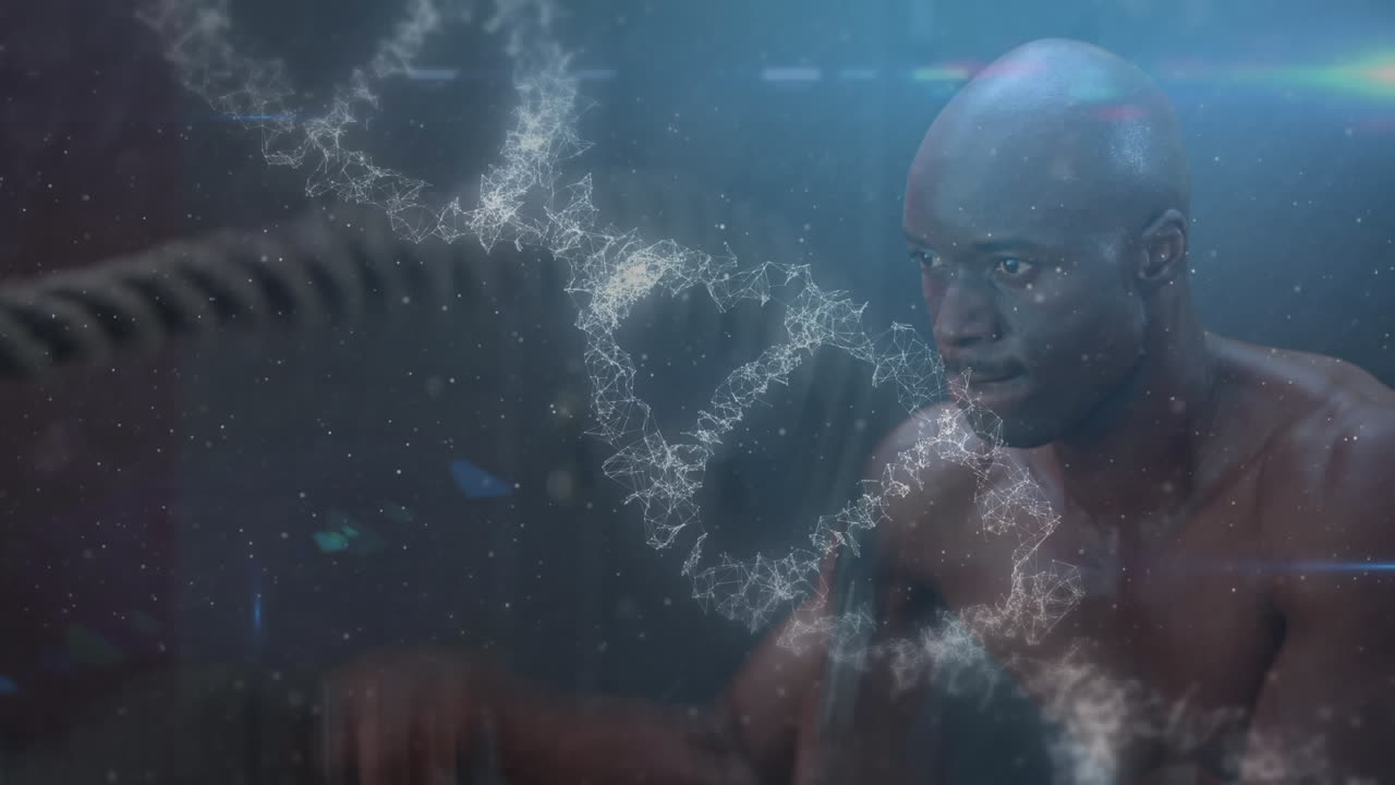 Animation of dna strand over muscular man exercising in gym