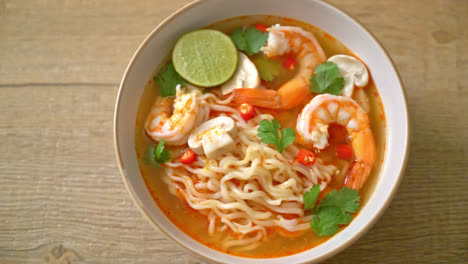 instant noodles ramen in spicy soup with shrimps - asian food style