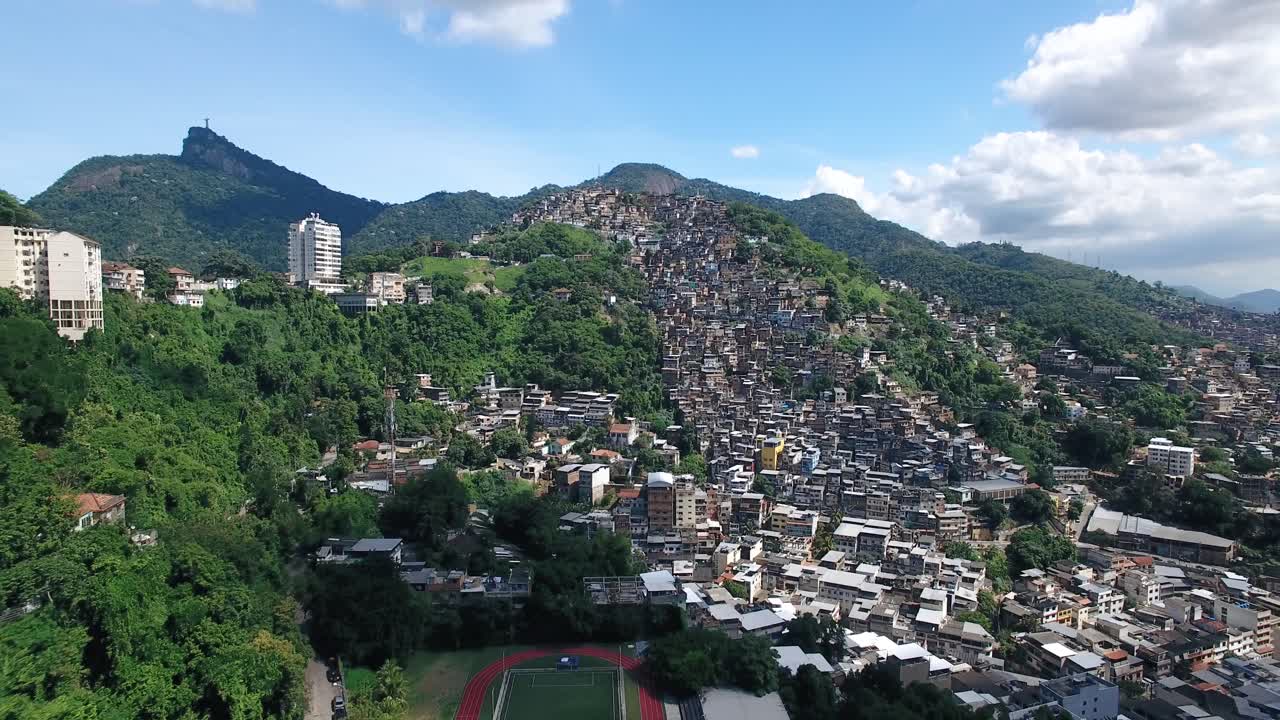 Aerial View Of A Favela In Santa Teresa, Rio De Janeiro, Christ The Redeemer In Distance