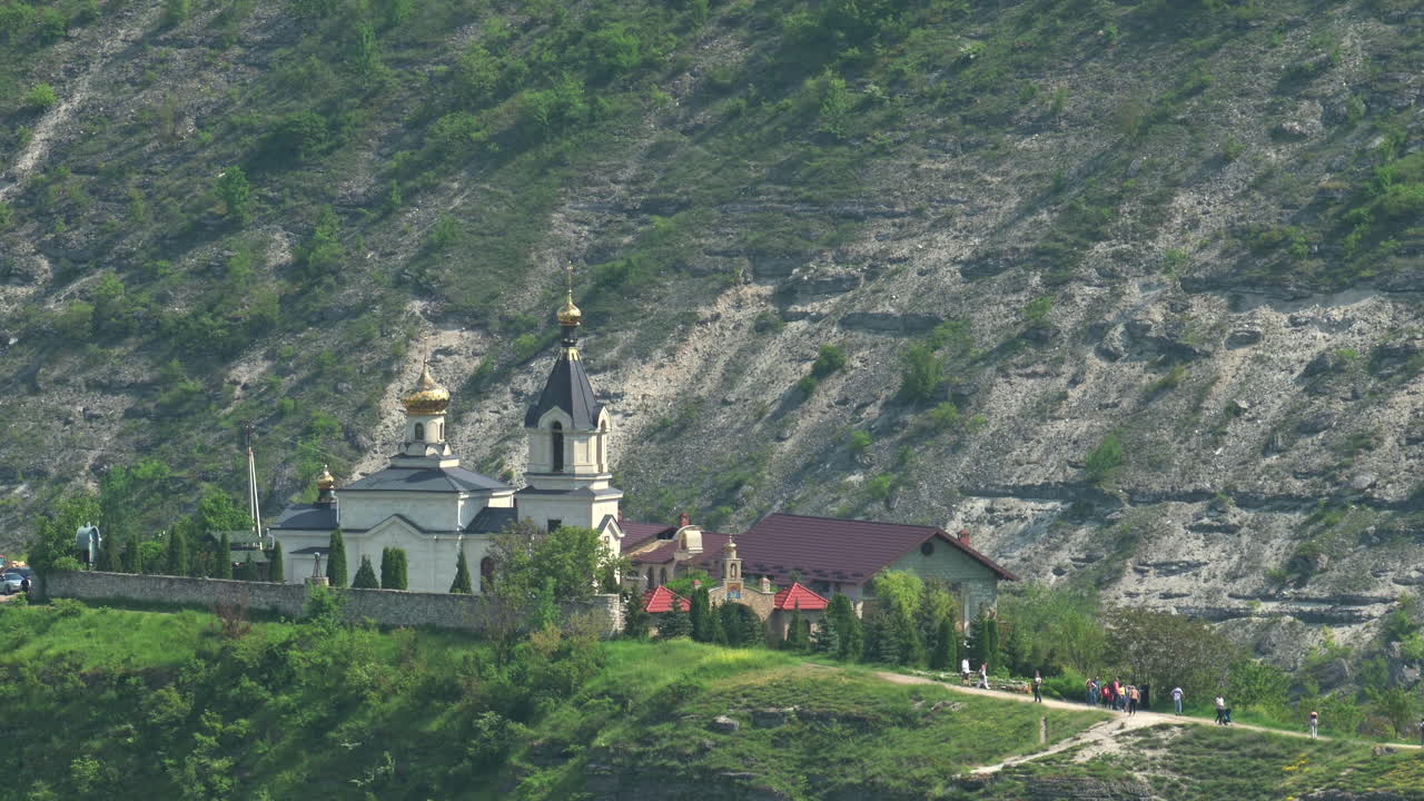 People visiting the church in Old Orhei historical and archaeological complex in Moldova