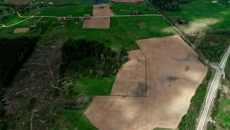 partitioned fields, harvested and unharvested, unplanted, seen from above