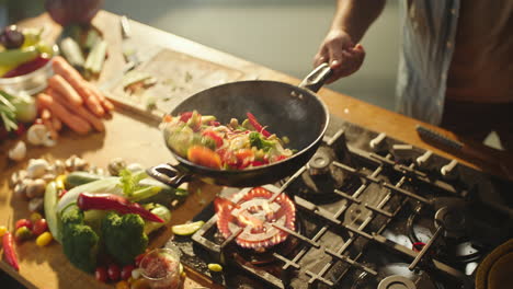 cooking vegetables in a wok