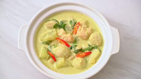 green curry soup with minced pork and meatball - asian food style