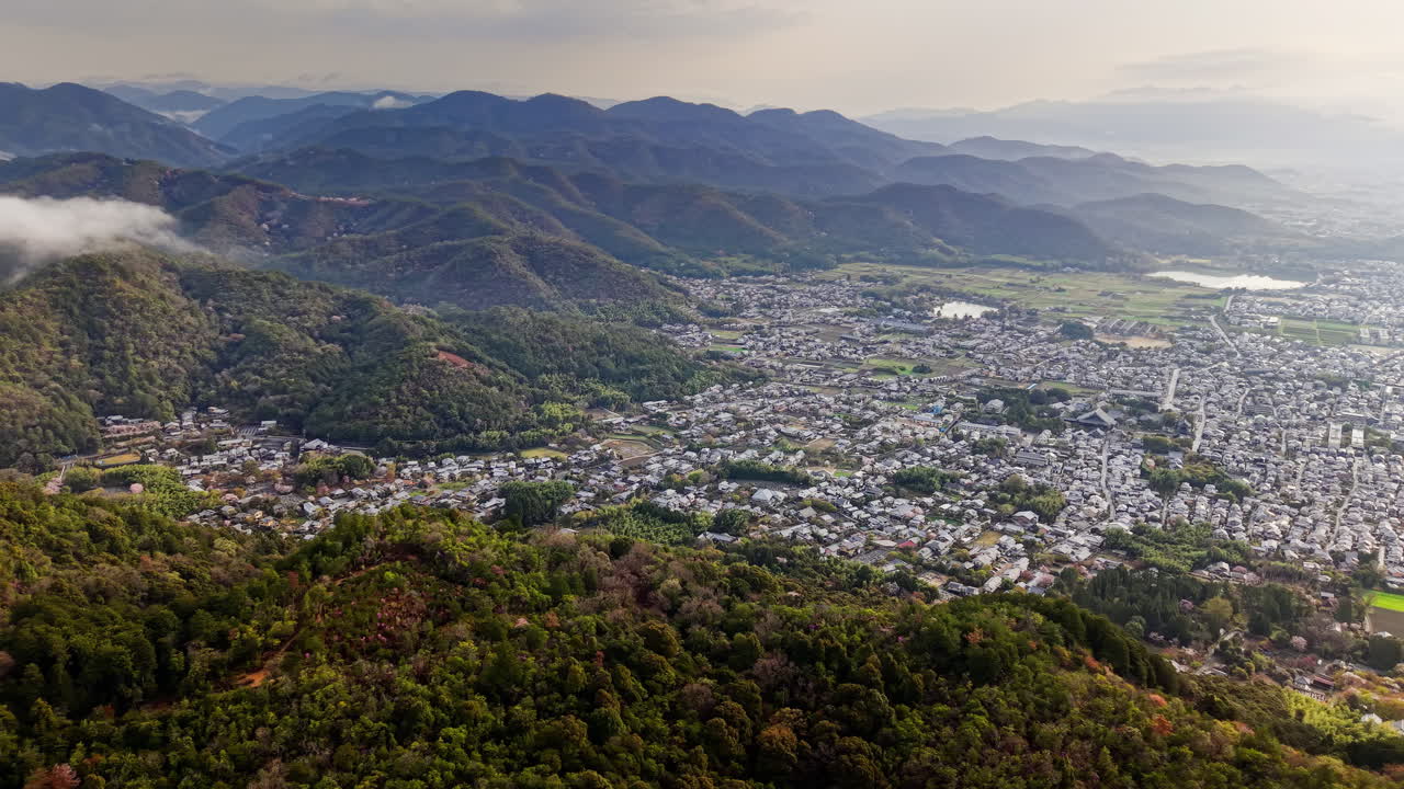 Aerial drone view of the Arashiyama district in Kyoto Japan in daylight