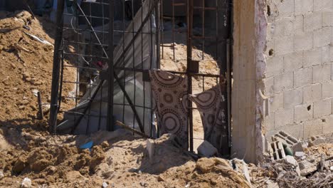 remains of a recently bombed building in war-torn gaza