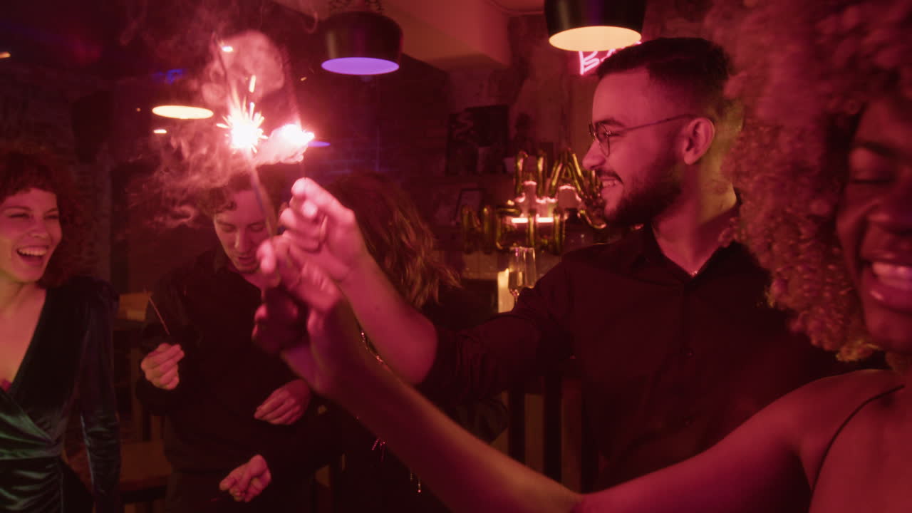 People Celebrating with Sparklers