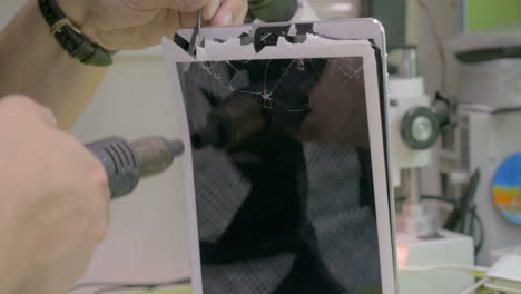 Tablet PC with broken touchscreen on repair service