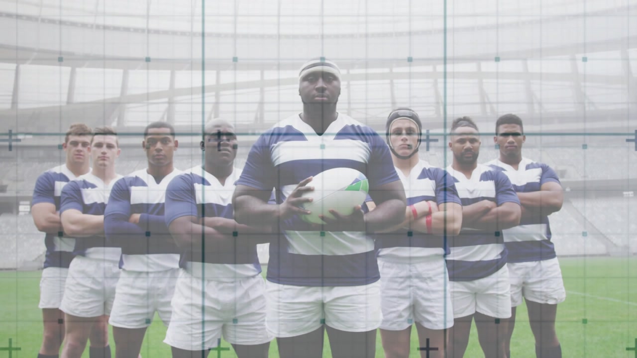 Rugby captain posing with teammates grid lines flickering camera zooming showing ball for sports ad