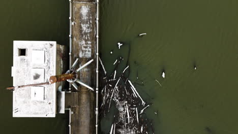 Top-view-of-old-abandoned-bridge-in-Lake-Sequoyah,-Arkansas,-aerial-shot