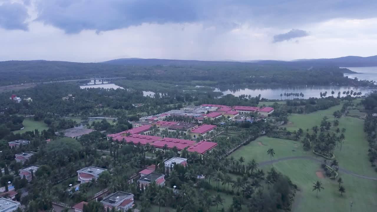 Aerial View Of The LaLiT Golf And Spa Resort In Raj Baga, Palolem, Canacona, Goa, India - aerial drone shot