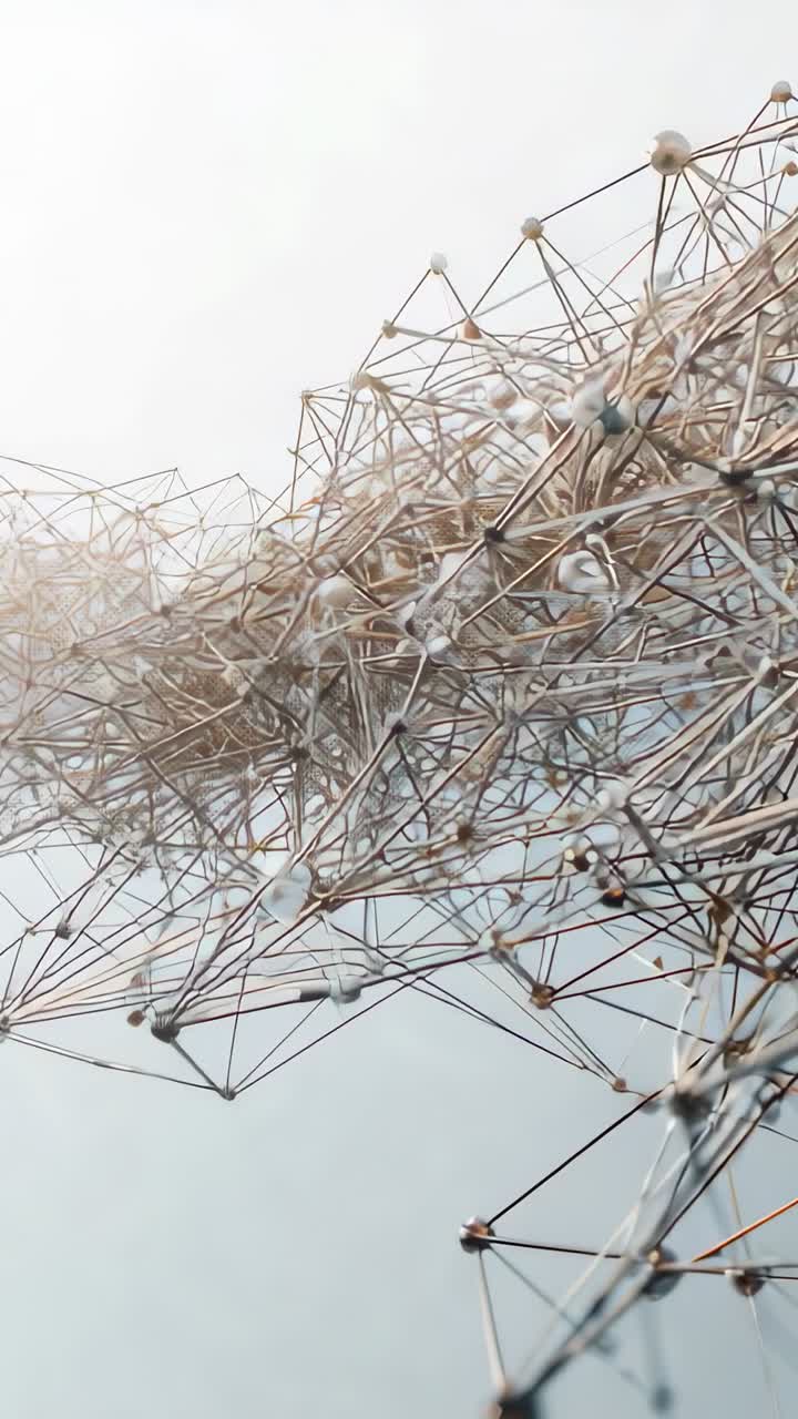 Vertical video: Camera pushing metallic mesh rising and rearranging in studio, revealing beads