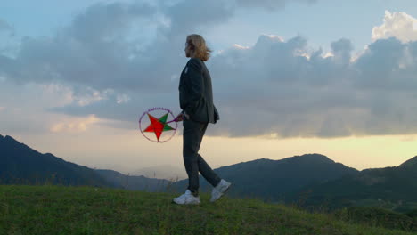 slow motion shot of a woman holding a star lantern celebrating the mid-autumn festival