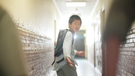 a child running in a school hallway