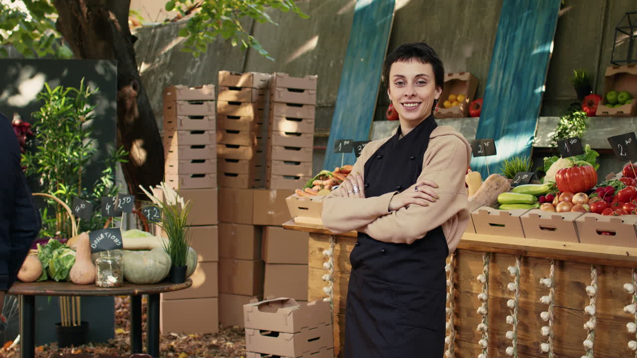 Woman selling fresh vegetables at a local farmers market