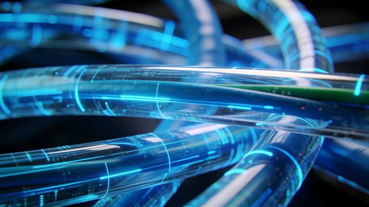 Moving camera revealing bundle of translucent tubes in close-up, with blue holographic circuitry