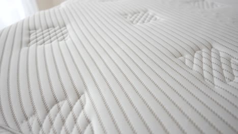 close up of a white mattress