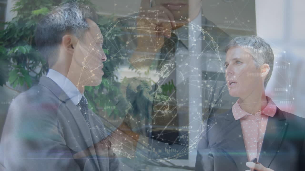 Discussing global network connections, business professionals collaborating in office setting