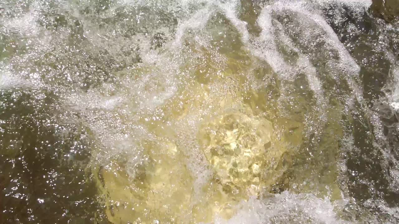 Water is flowing over the stones.