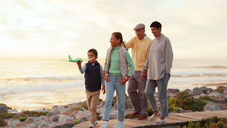 Family,-walking-and-beach-with-boy