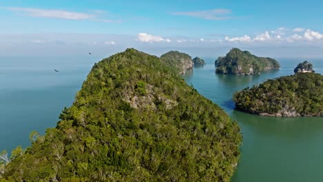 Remote-wooded-islands,-national-park-in-Dominican-republic,-aerial-forward