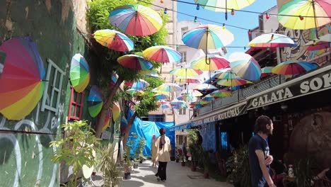 umbrellas covering the streets of istanbul, turkey. concept of shaded urban space and creative street design.