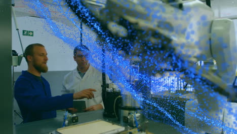animation of blue glowing mesh over male scientist with robot and tablet