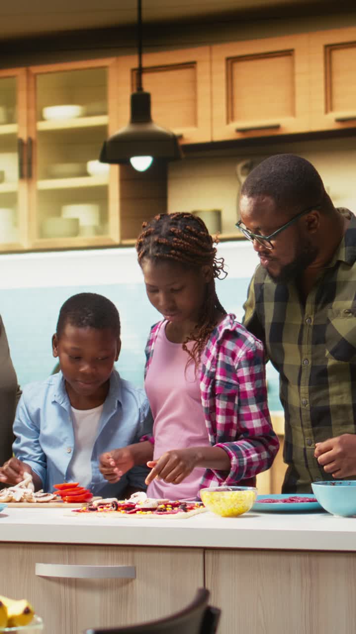 Vertical Video Parents and jolly children making pizza in their cozy kitchen at home