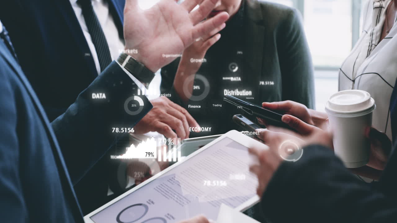 Business Meeting with Data Analysis and Technology Overlay