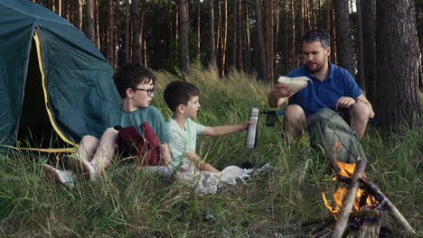 Family camping in the forest